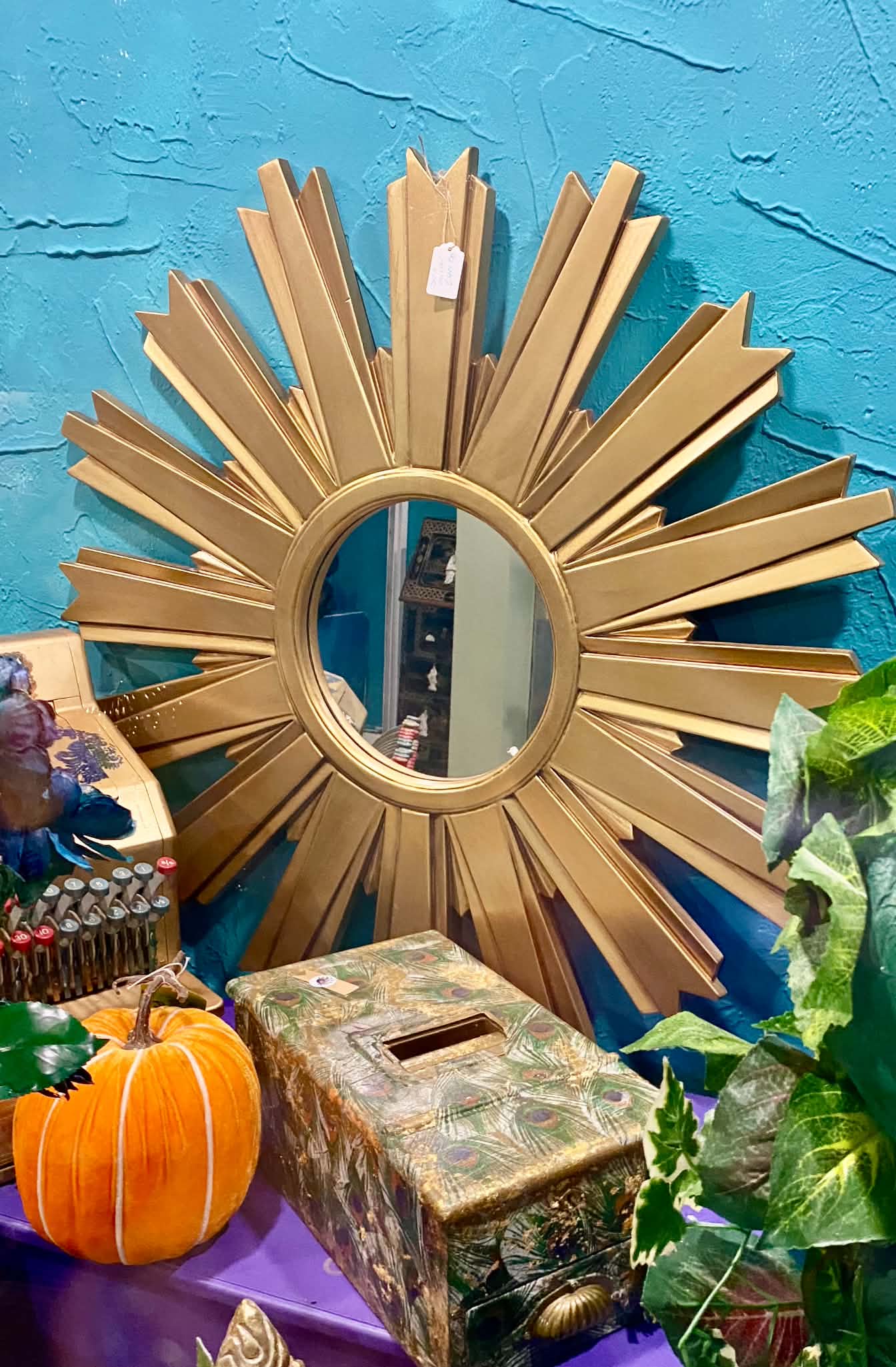 Gold sunburst mirror